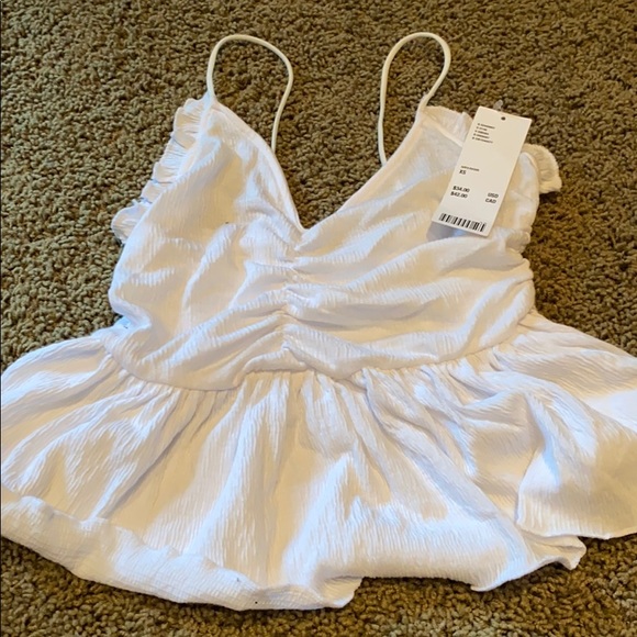 Urban Outfitters Tops - NWT urban outfitters white tank top size Xs